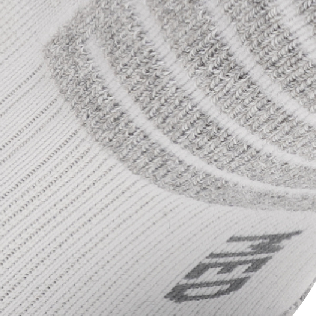 Close up view of elastic arch of Lightfeet Performance White Half Crew Sock