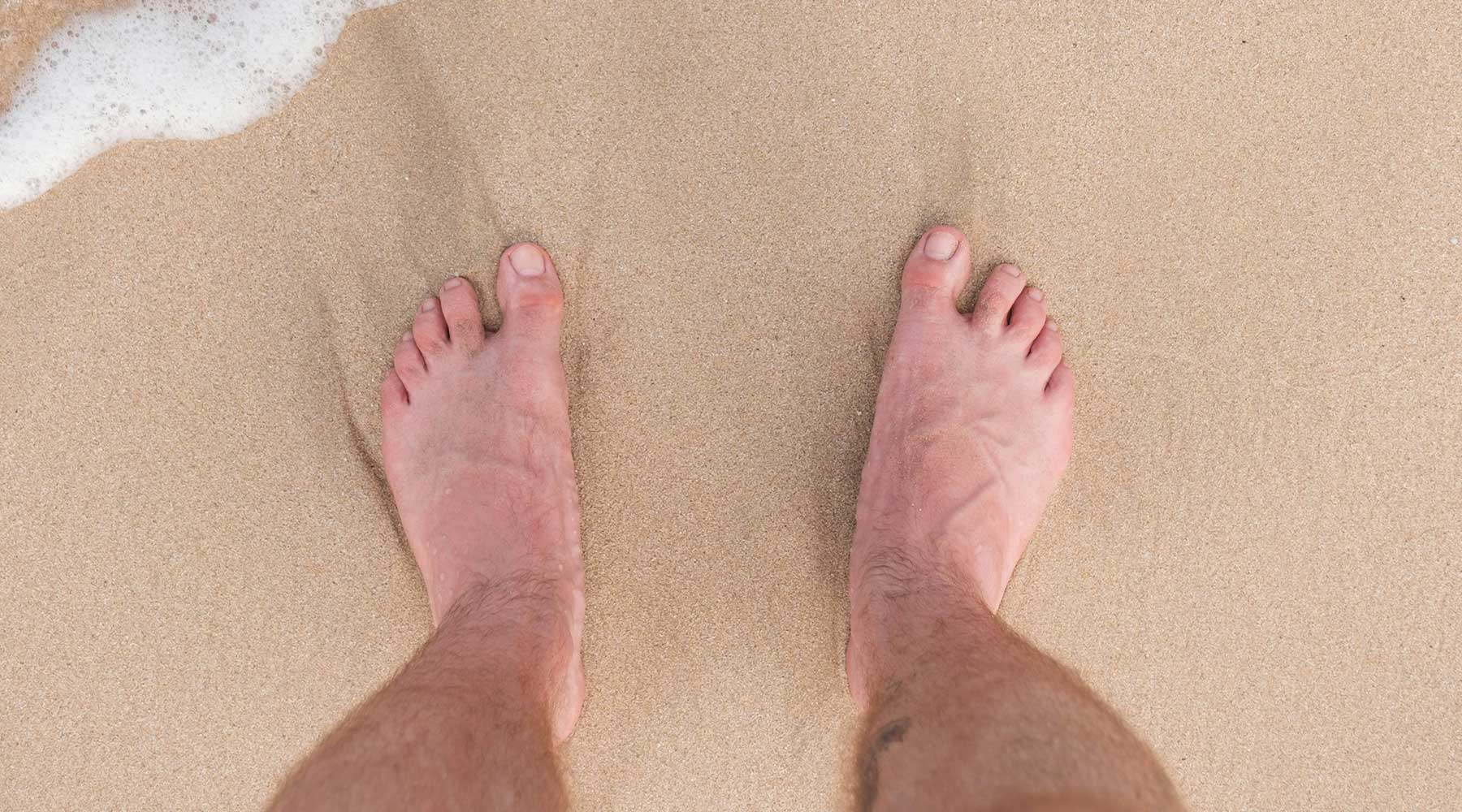 Bare feet on sand