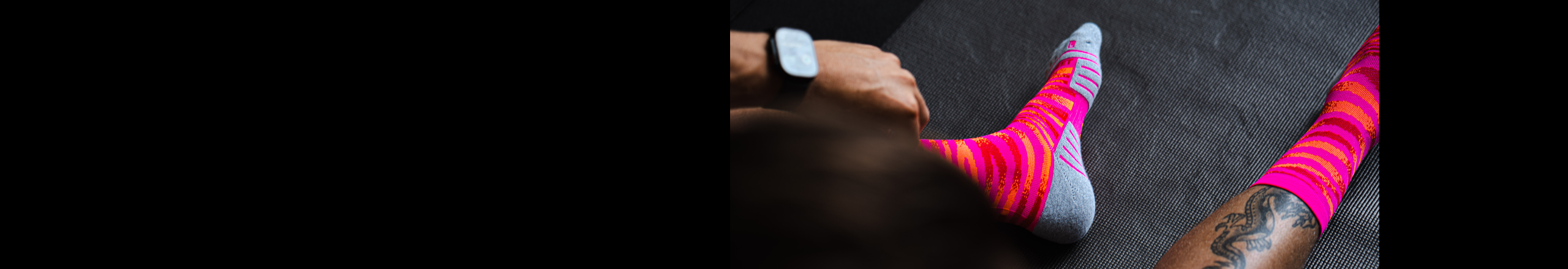 Female runner on boardwalk by ocean