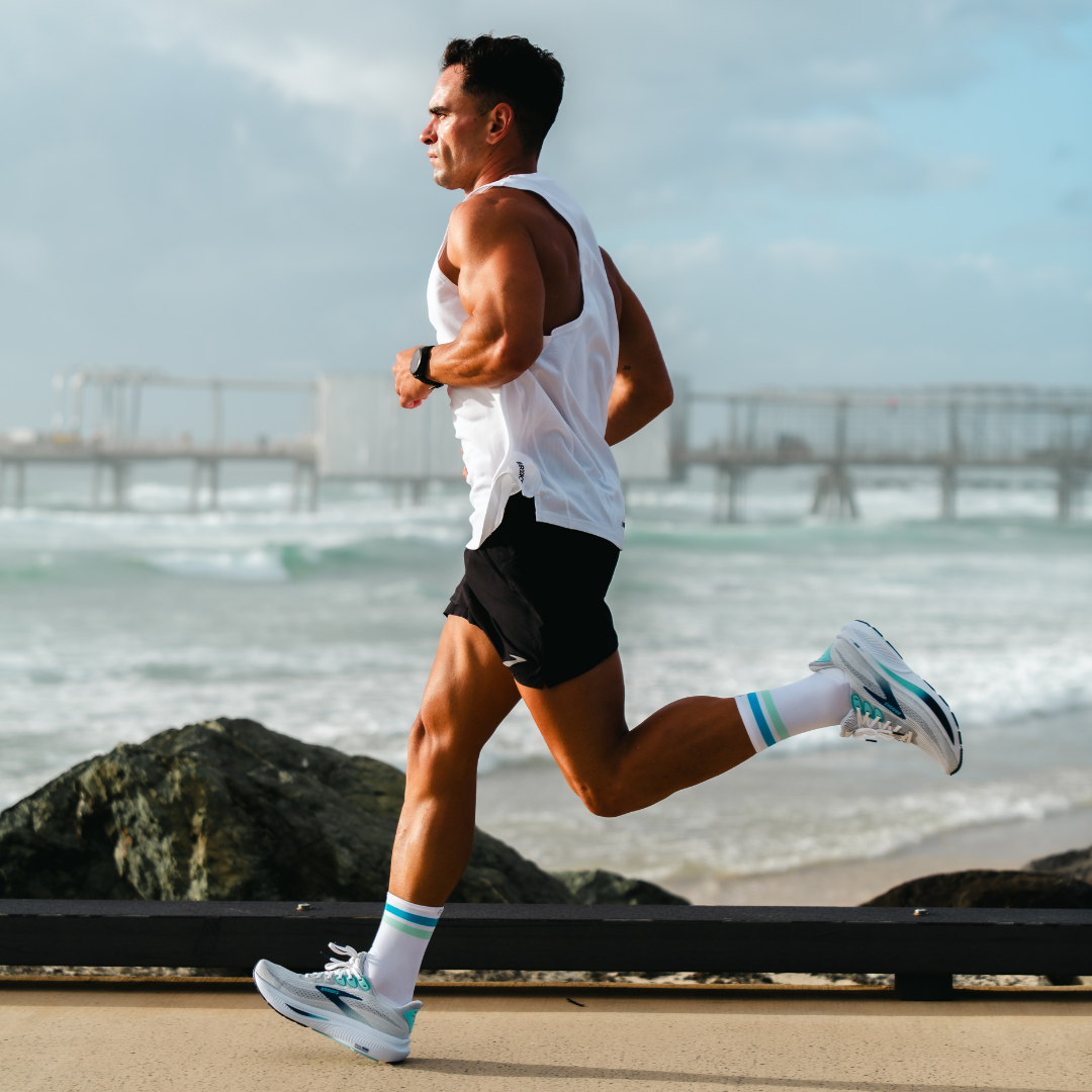 Image of person wearing Lightfeet Performance 2 Stripes White Blue Glacier Crew Socks 