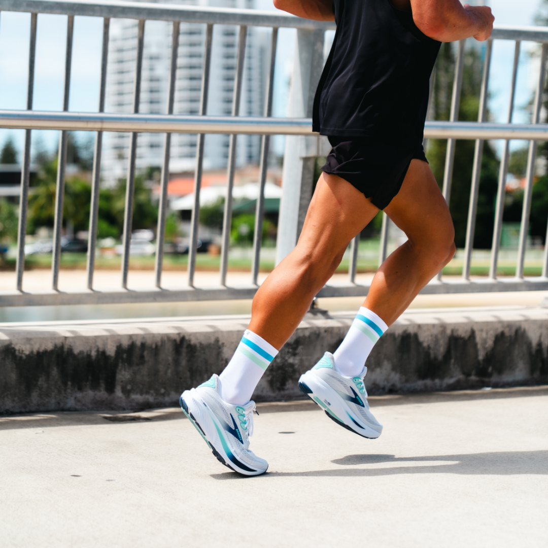 Image of person wearing Lightfeet Performance 2 Stripes White Blue Glacier Crew Socks 