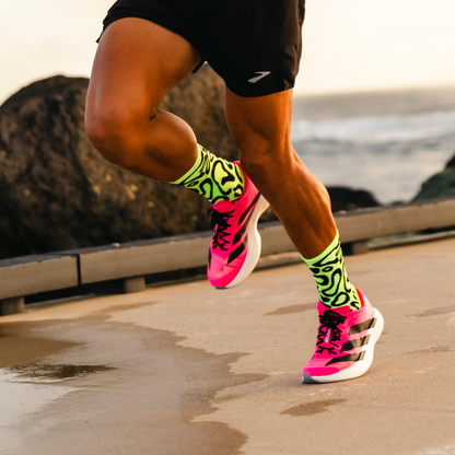 Image of person wearing Lightfeet Performance Scribbles Yellow Black Crew Socks 