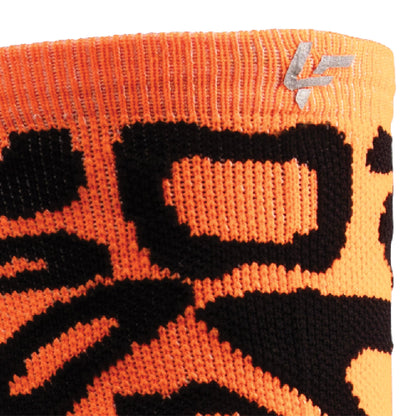 Close up view of reflective print symbol on Lightfeet Performance Scribbles Orange Black Crew Socks 
