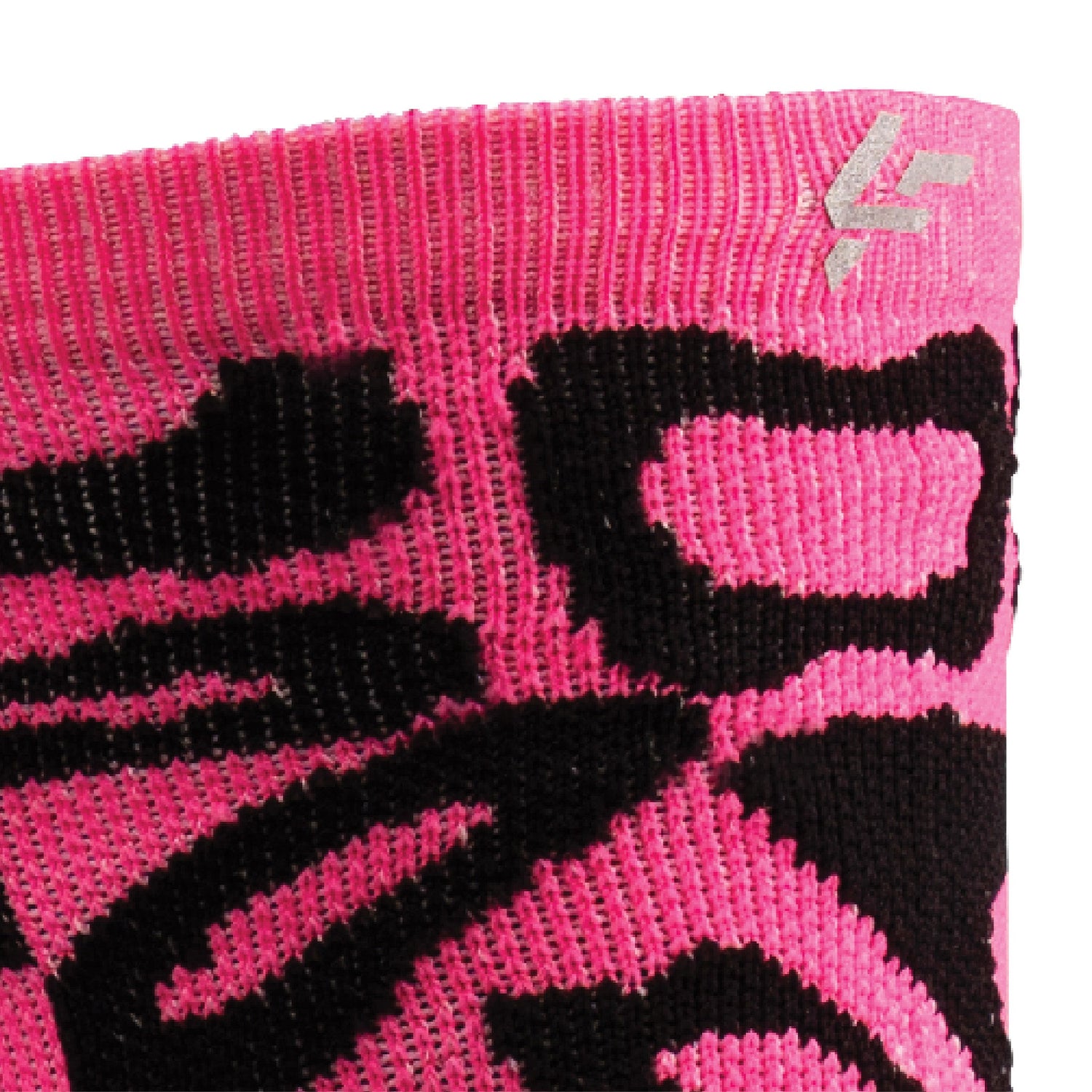Close up view of reflective print symbol on Lightfeet Performance Scribbles Pink Black Crew Socks 