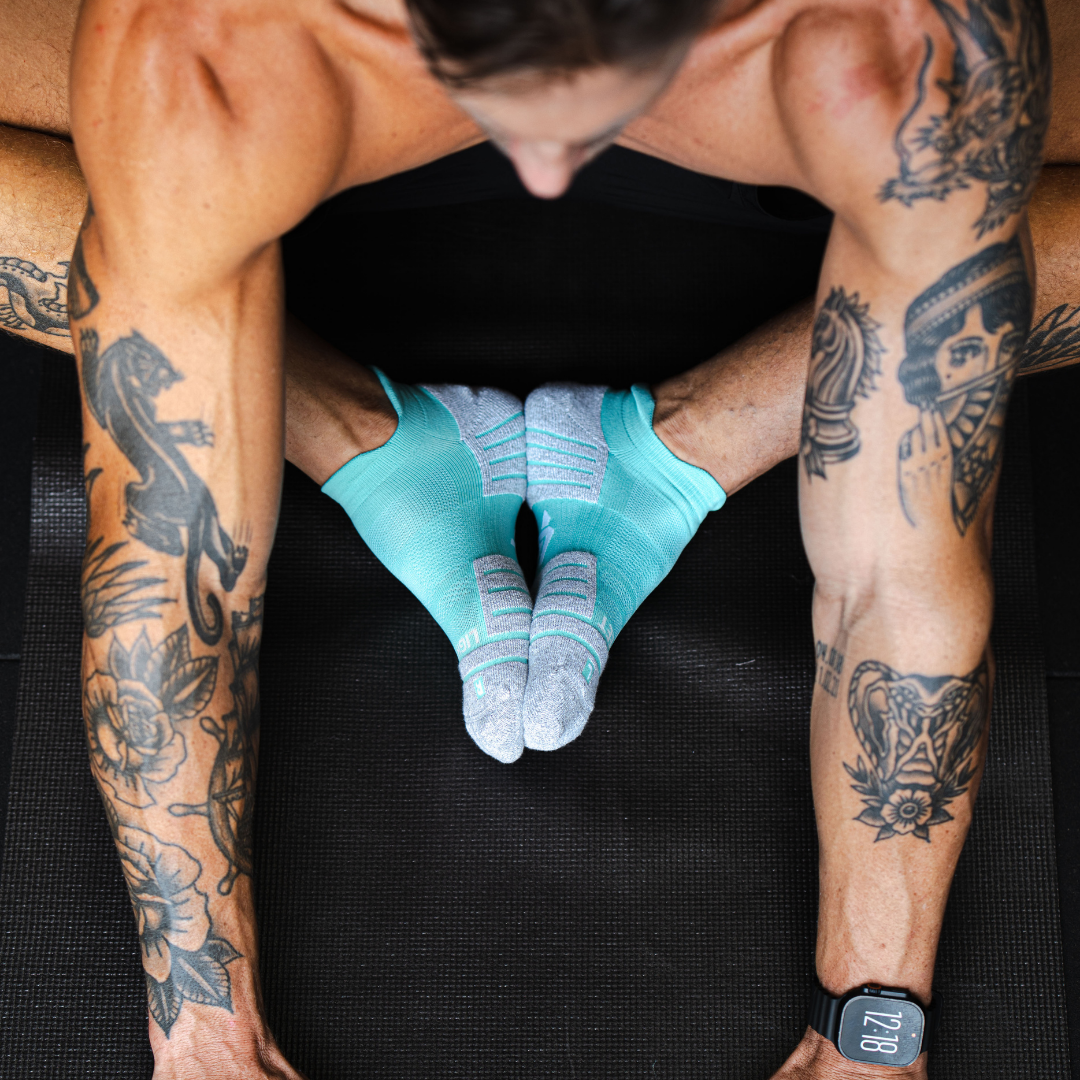 Person wearing Lightfeet Performance Mint Ankle Sock 